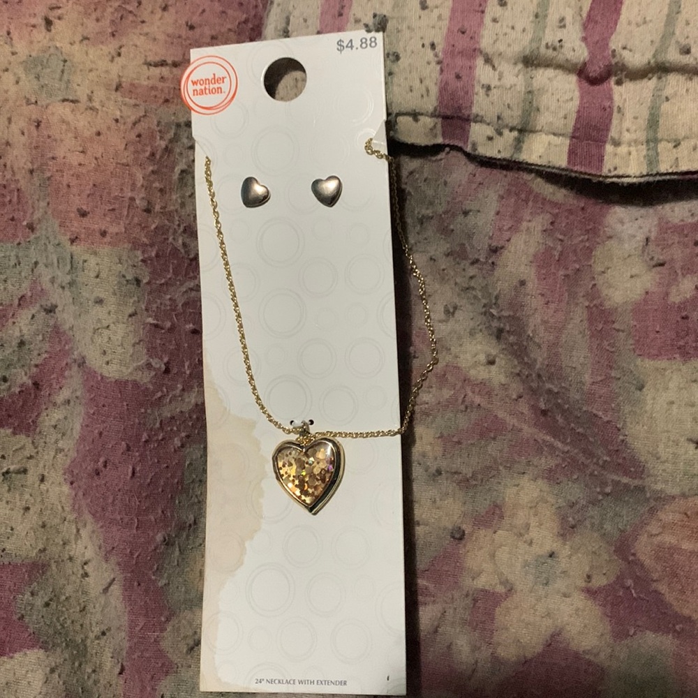 Heart shaped locket necklace with matching earrings